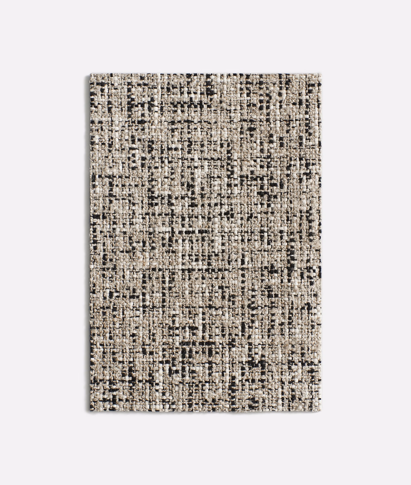 Black, grey and ivory Hurluberlu Domino with a dense nubby tweed weave