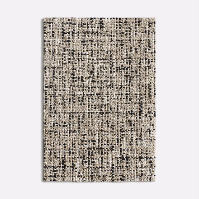 Black, grey and ivory Hurluberlu Domino with a dense nubby tweed weave