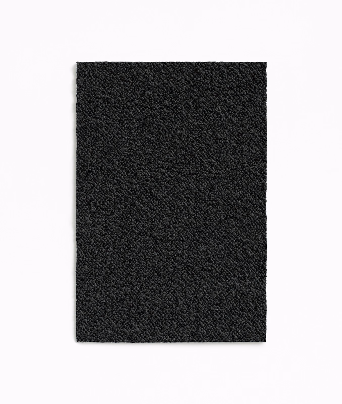 Deep charcoal fabric swatch with dense, fine nubby texture and subtle diagonal grain