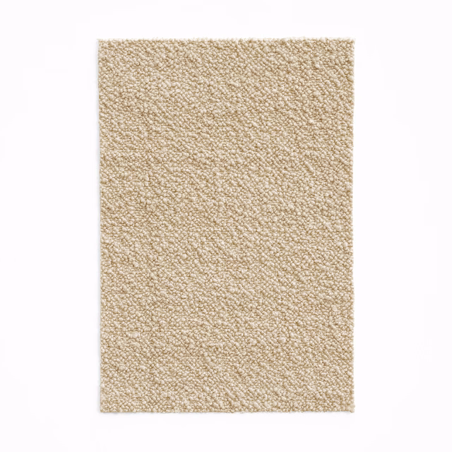 Warm oatmeal-beige swatch showing a dense, softly looped nubby weave