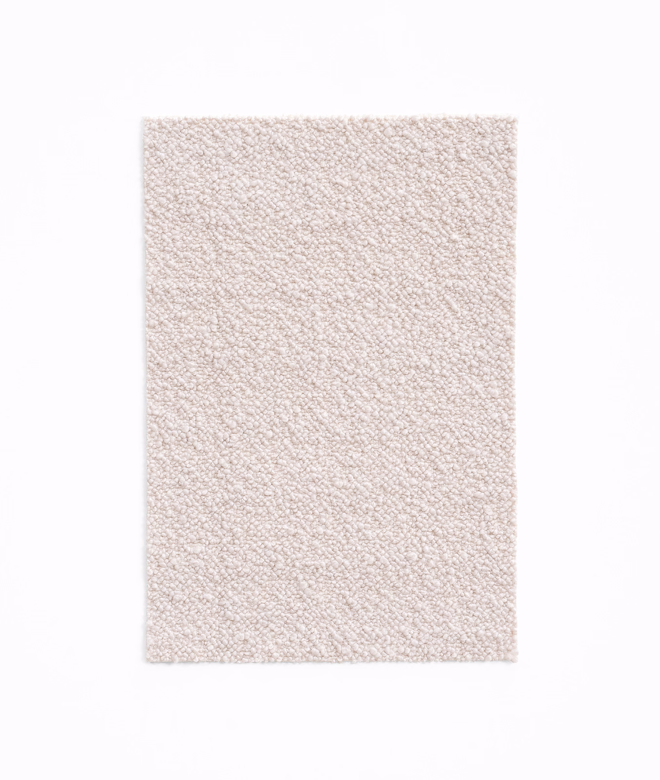 Pale blush-pink textile swatch with a dense, softly looped nubby texture