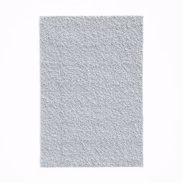 Pale cool-grey Karakorum Perla swatch with dense, softly nubby looped texture
