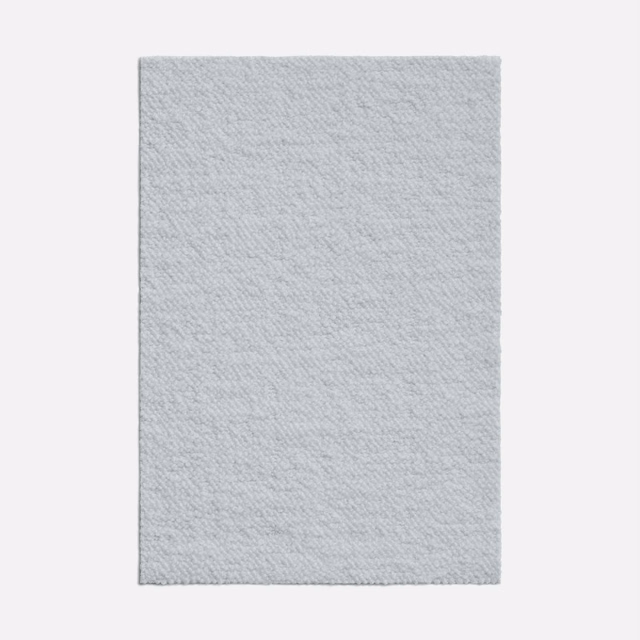 Pale cool-grey Karandash textile swatch showing a subtle diagonal woven texture