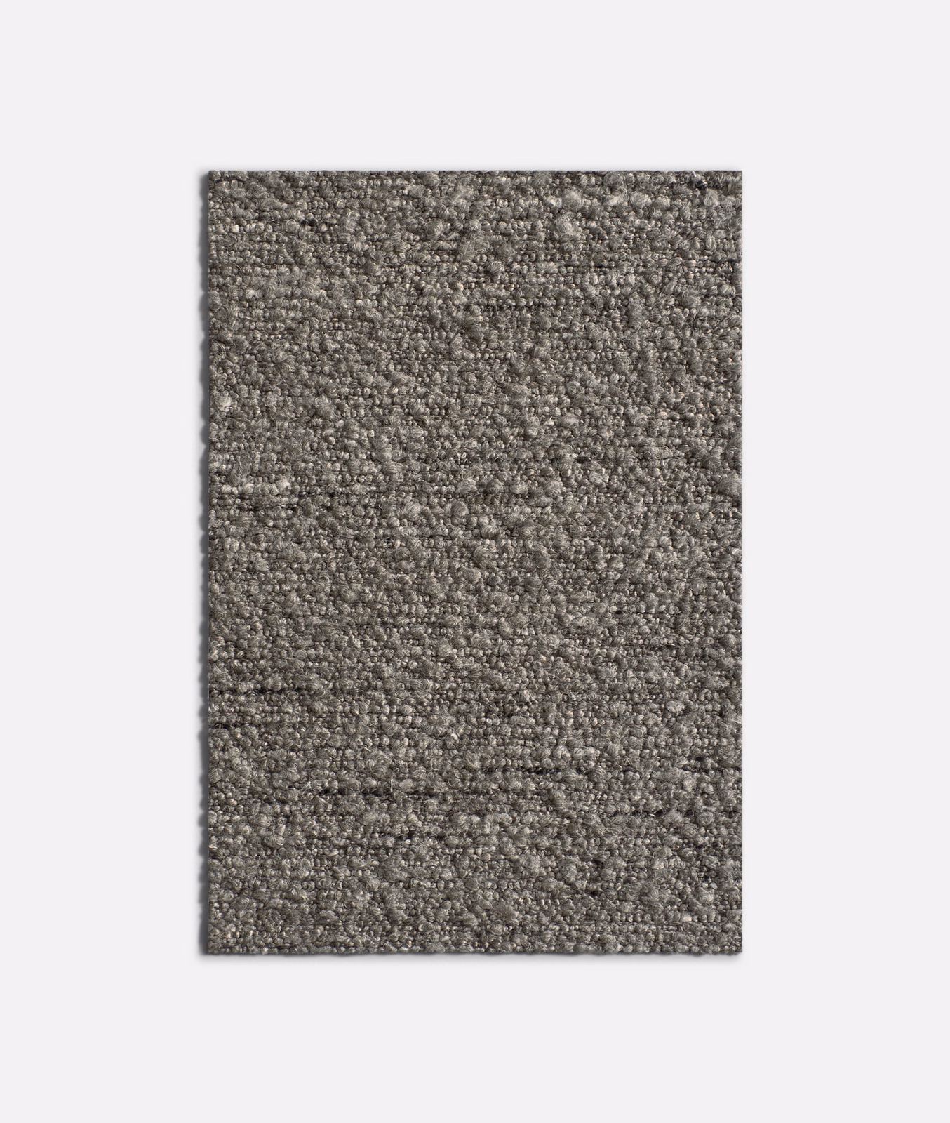 Mottled clay-taupe Lamberto Argilla showing a dense, nubby woven texture