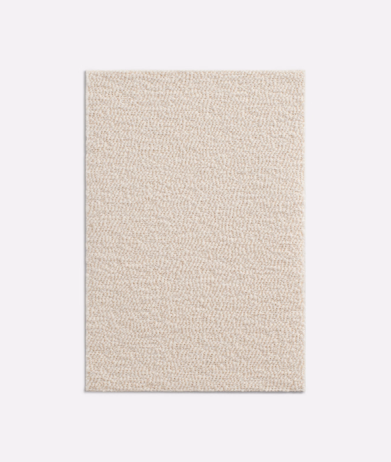 Warm ivory swatch showing a dense, fine looped bouclé texture