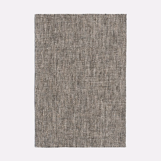 Mottled taupe-grey woven fabric with faint rectangular tonal patterning