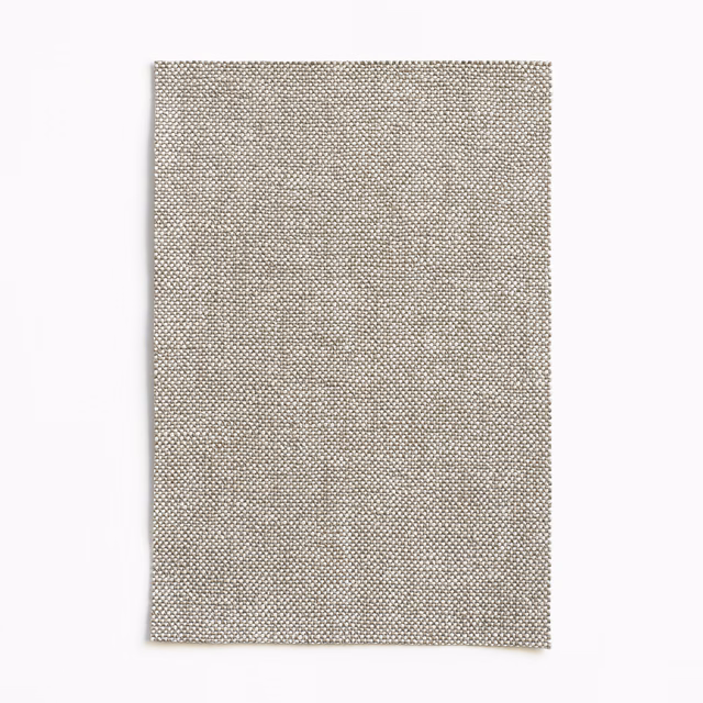 Cool taupe-grey Madeira Argento swatch with dense flecked woven texture