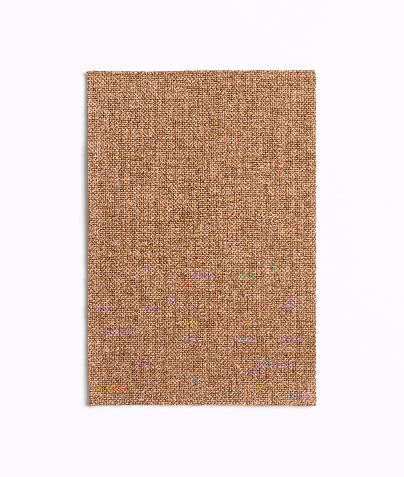 Warm cuoio-tan fabric swatch showing a fine, tightly woven plain texture