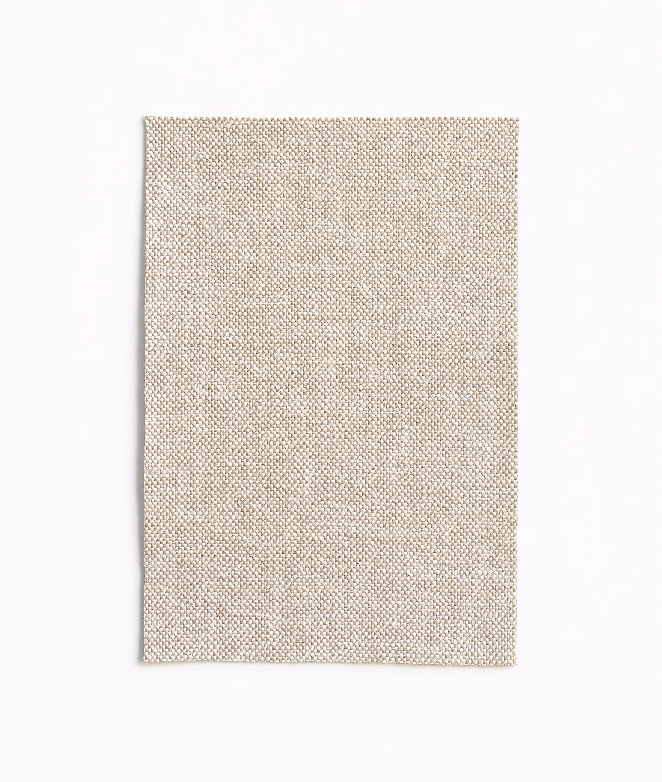 Warm natural beige tightly woven textile with subtle tonal flecks