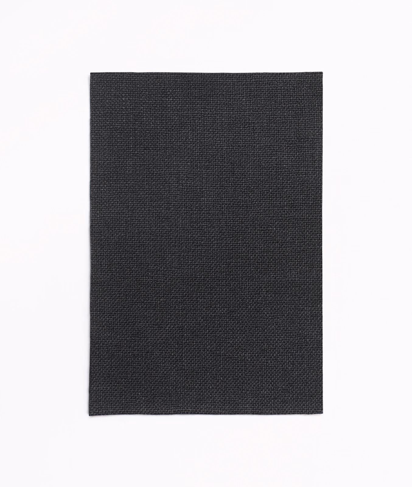 Deep charcoal-black fabric swatch showing a fine, even woven texture