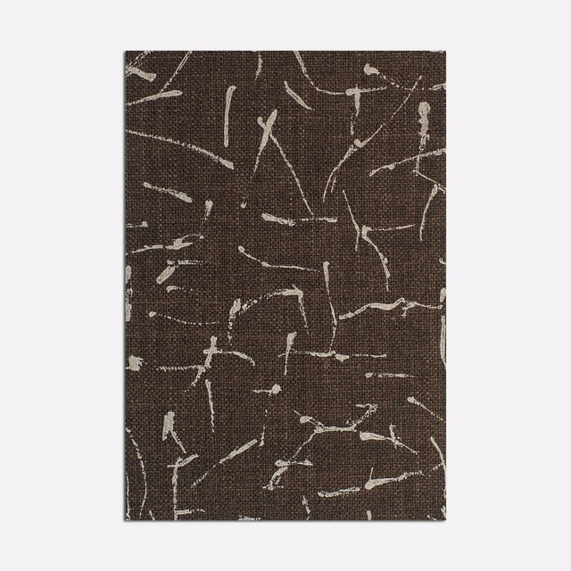 Deep espresso-brown woven swatch with scattered pale, chalk-like linear marks