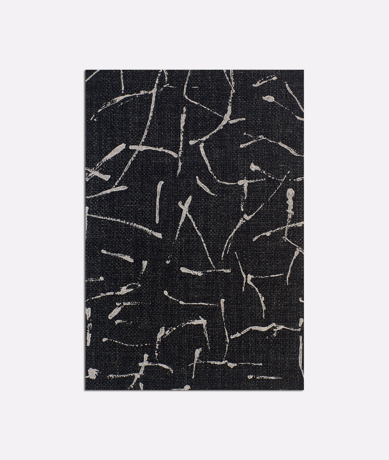 Charcoal-black woven fabric with scattered ivory, map-like linear marks