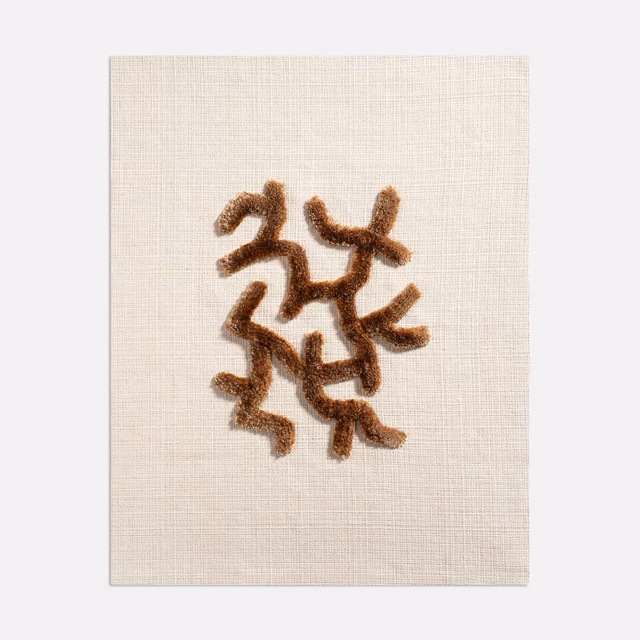 Warm cream woven ground with raised umber-brown branching motif and fuzzy texture