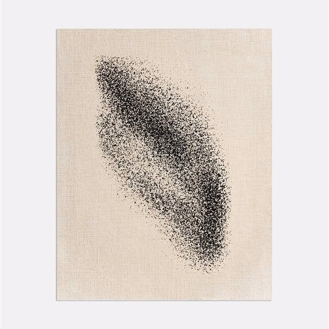 Warm ivory woven swatch with a dense charcoal speckled diagonal form