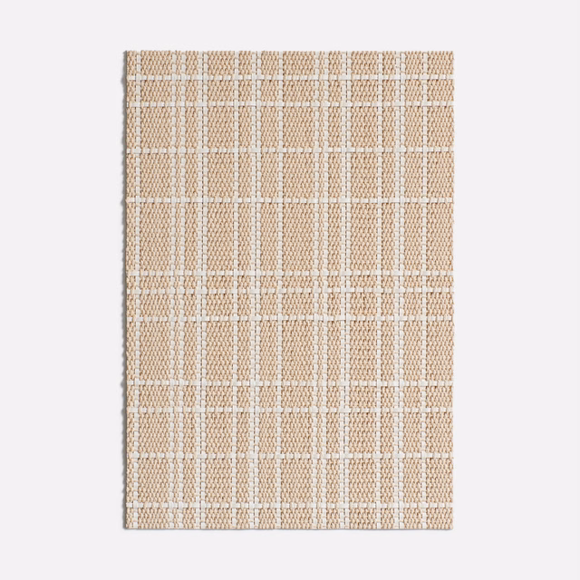 Warm magnolia-beige upholstery with a textured cream windowpane check