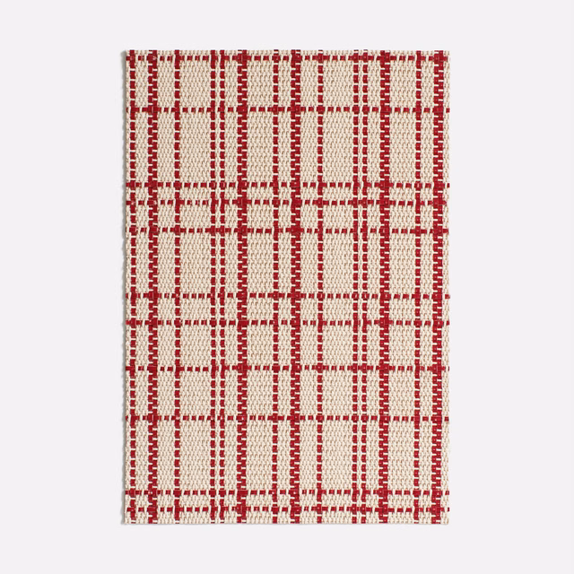 Cream woven fabric with a deep red irregular checked grid and tactile texture