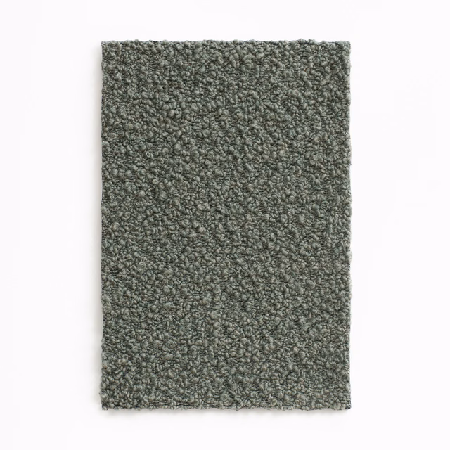 Muted loden green-grey fabric swatch with a dense, irregular nubby weave