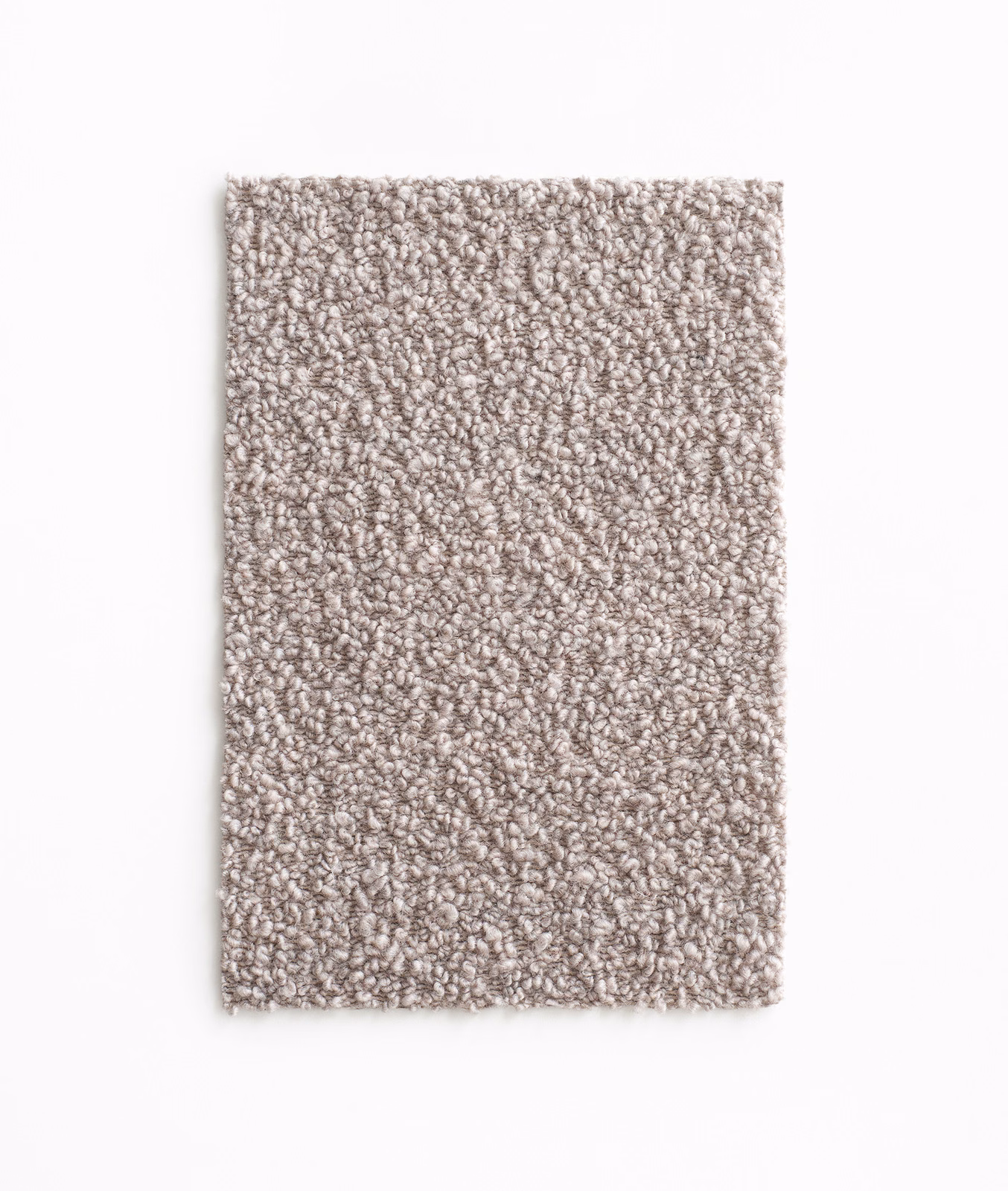 Close-up of pale taupe-grey fabric with dense irregular boucle loops and subtle flecking