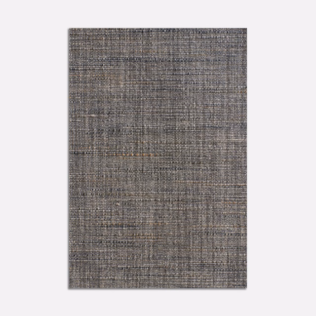 Cool slate-grey woven swatch with fine crosshatched texture and tonal flecks