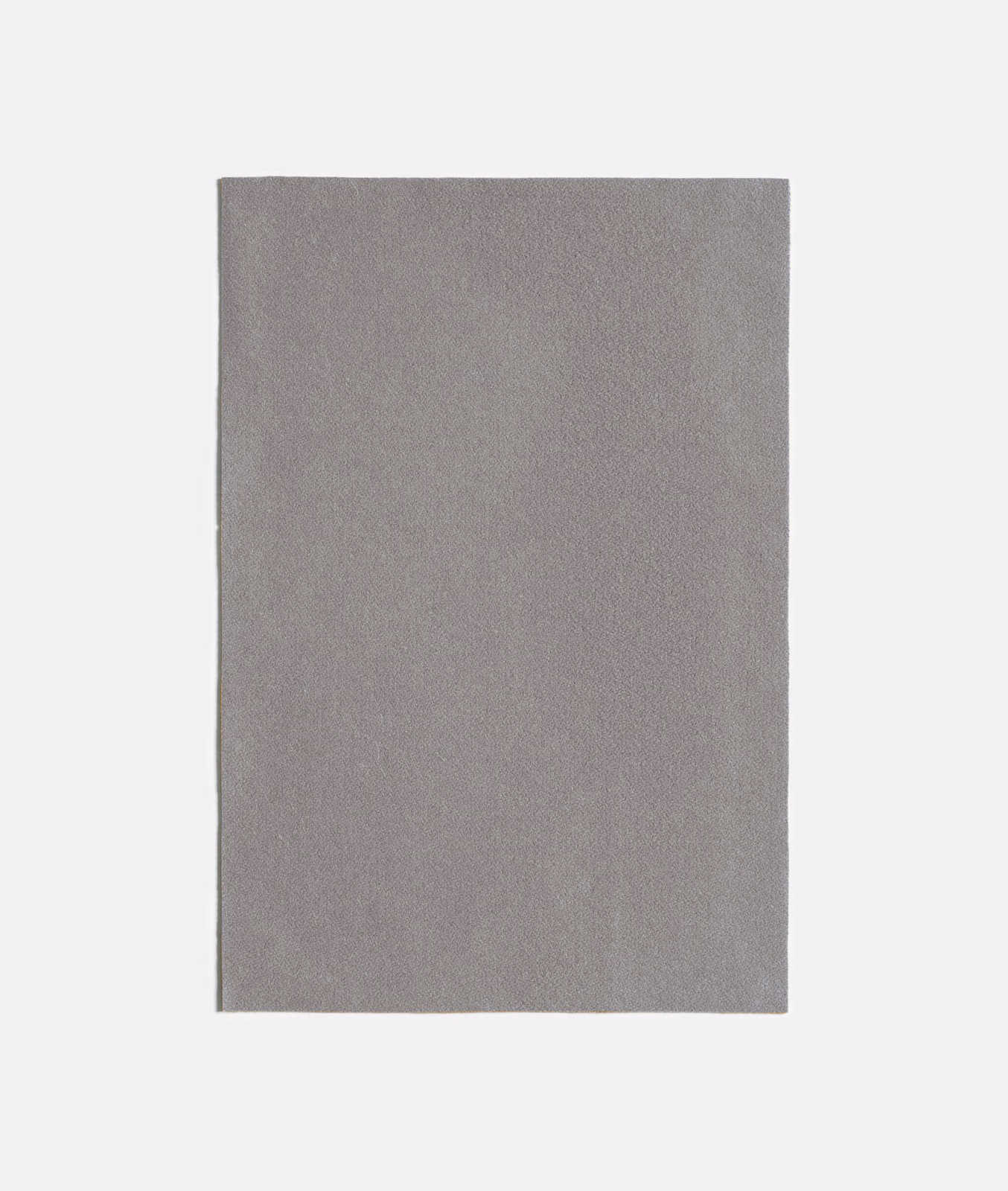 Muted taupe-grey plain fabric swatch with a fine, softly mottled woven texture