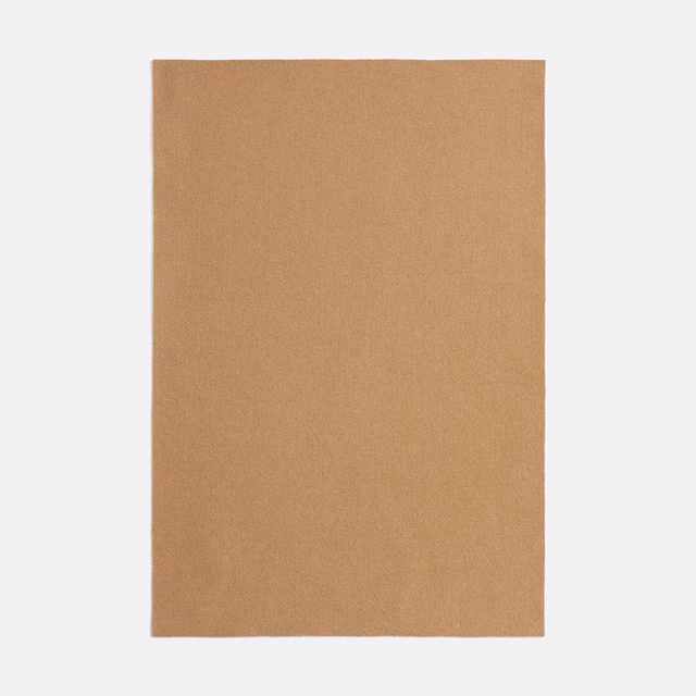 Warm camel-tan textile swatch with a fine, even matte surface and no visible motif