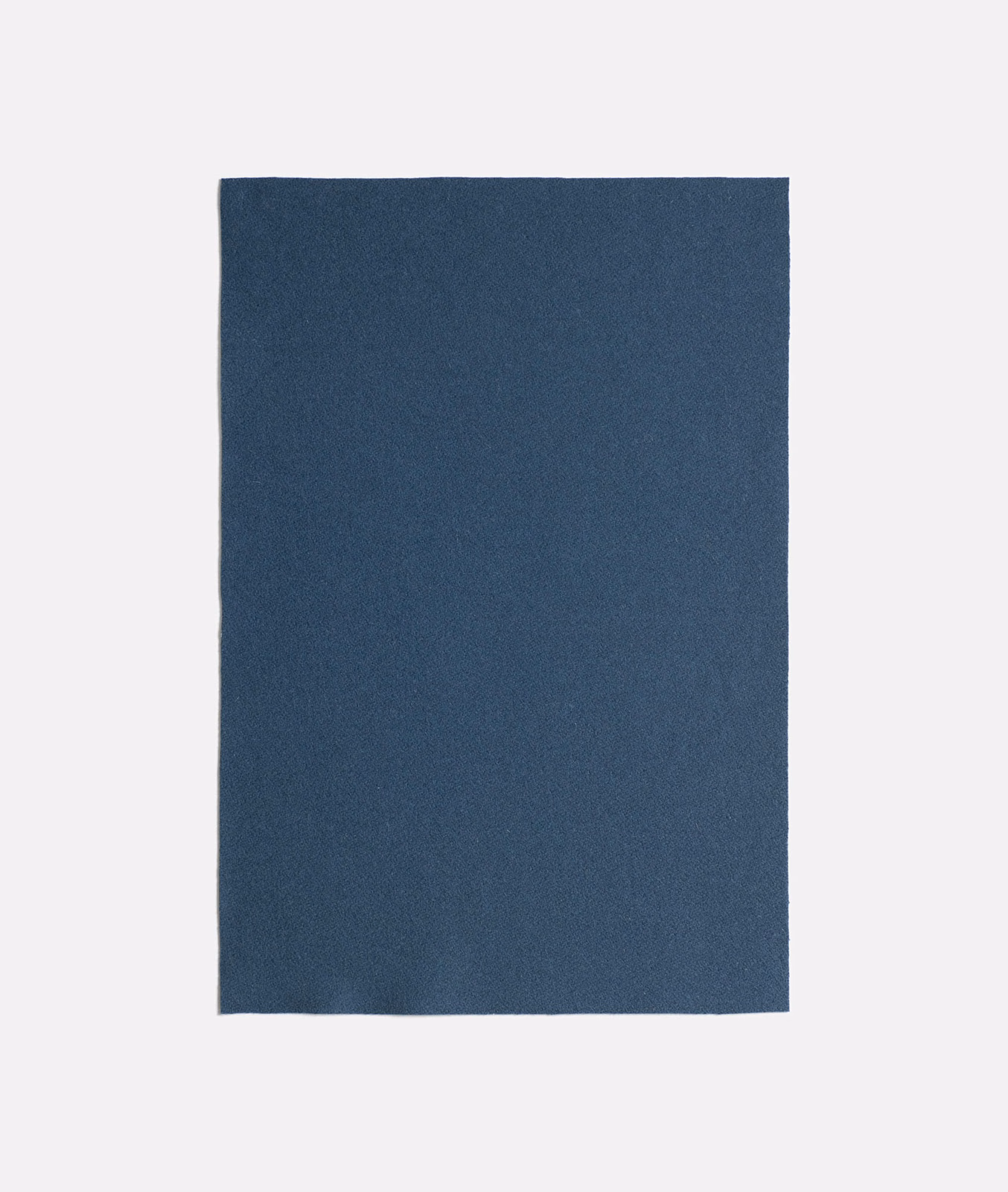 Deep blue-teal plain upholstery fabric with a subtly mottled matte texture