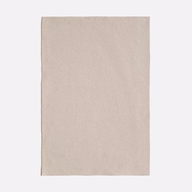 Pale greige Queneau Chinchilla swatch with a fine, softly mottled textile surface