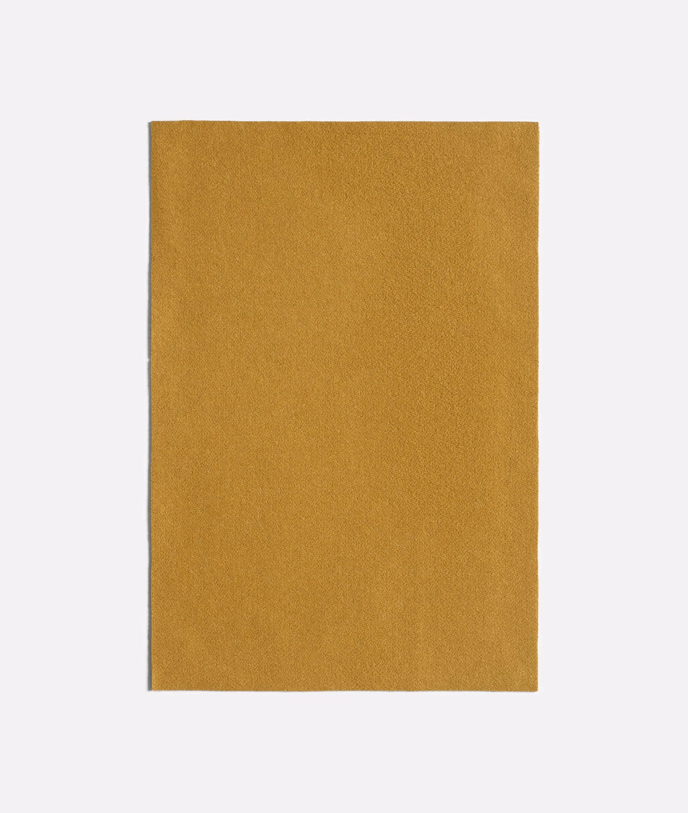 Warm cumin-ochre plain fabric with a fine, subtly textured matte weave