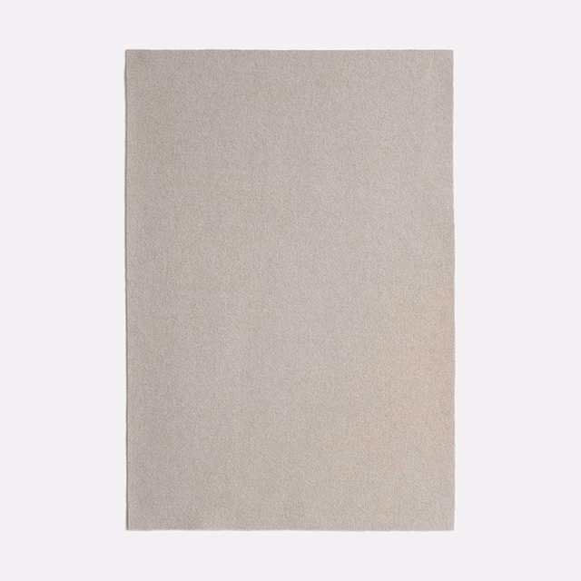 Pale warm taupe fine-grain woven textile with a softly matt surface