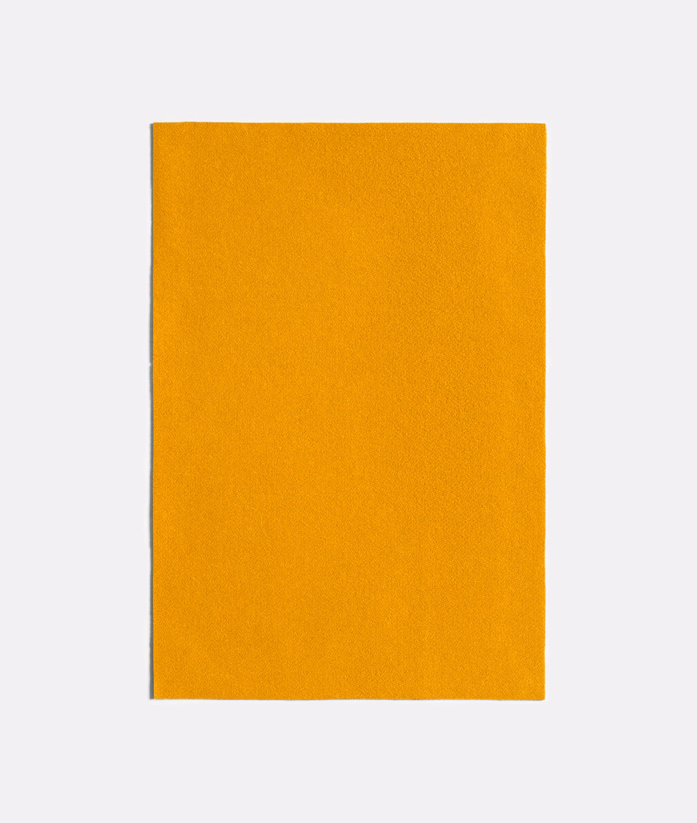 Warm mustard-yellow plain textile with a fine, subtly textured matte surface