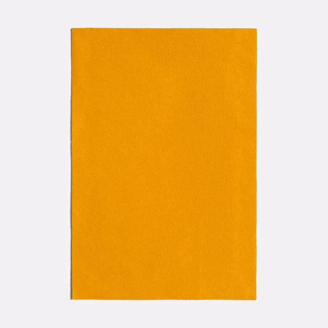 Warm mustard-yellow plain textile with a fine, subtly textured matte surface