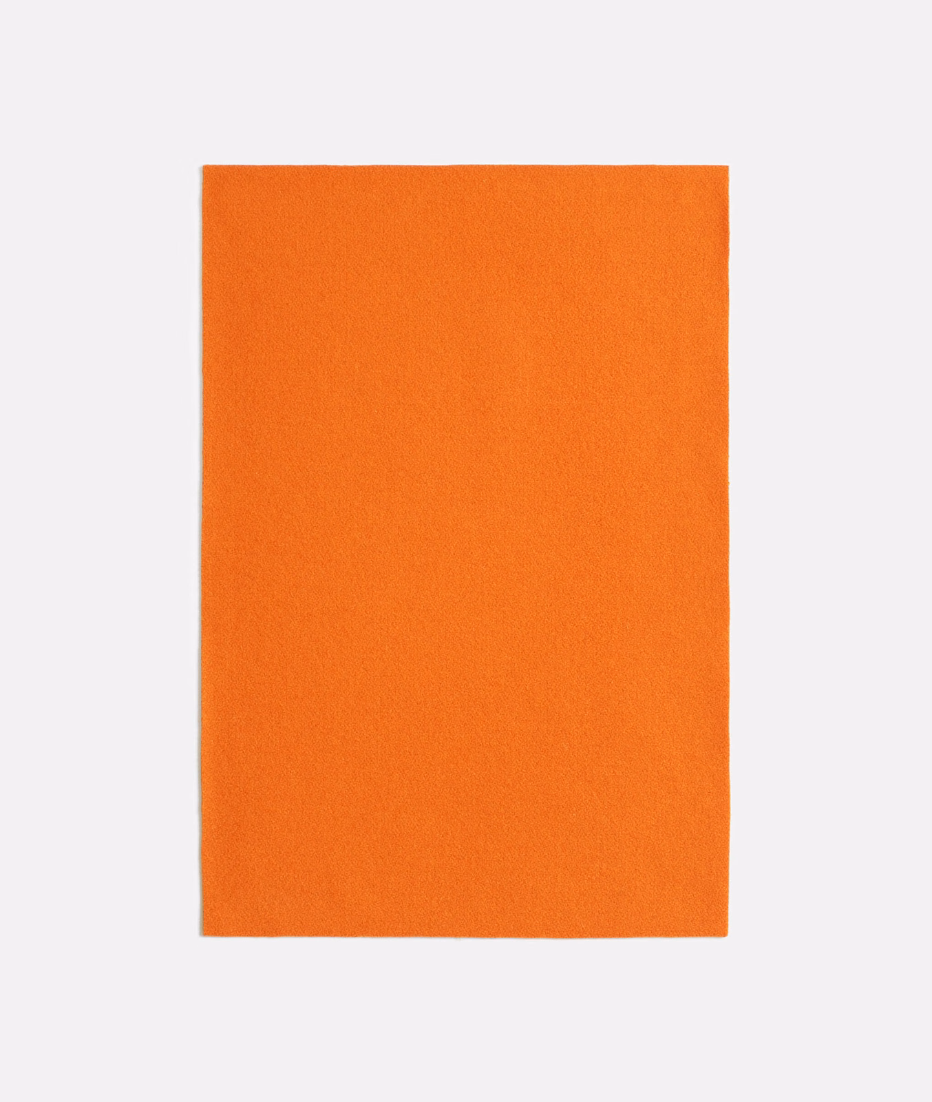 Saturated pumpkin-orange plain textile with a softly brushed, even surface