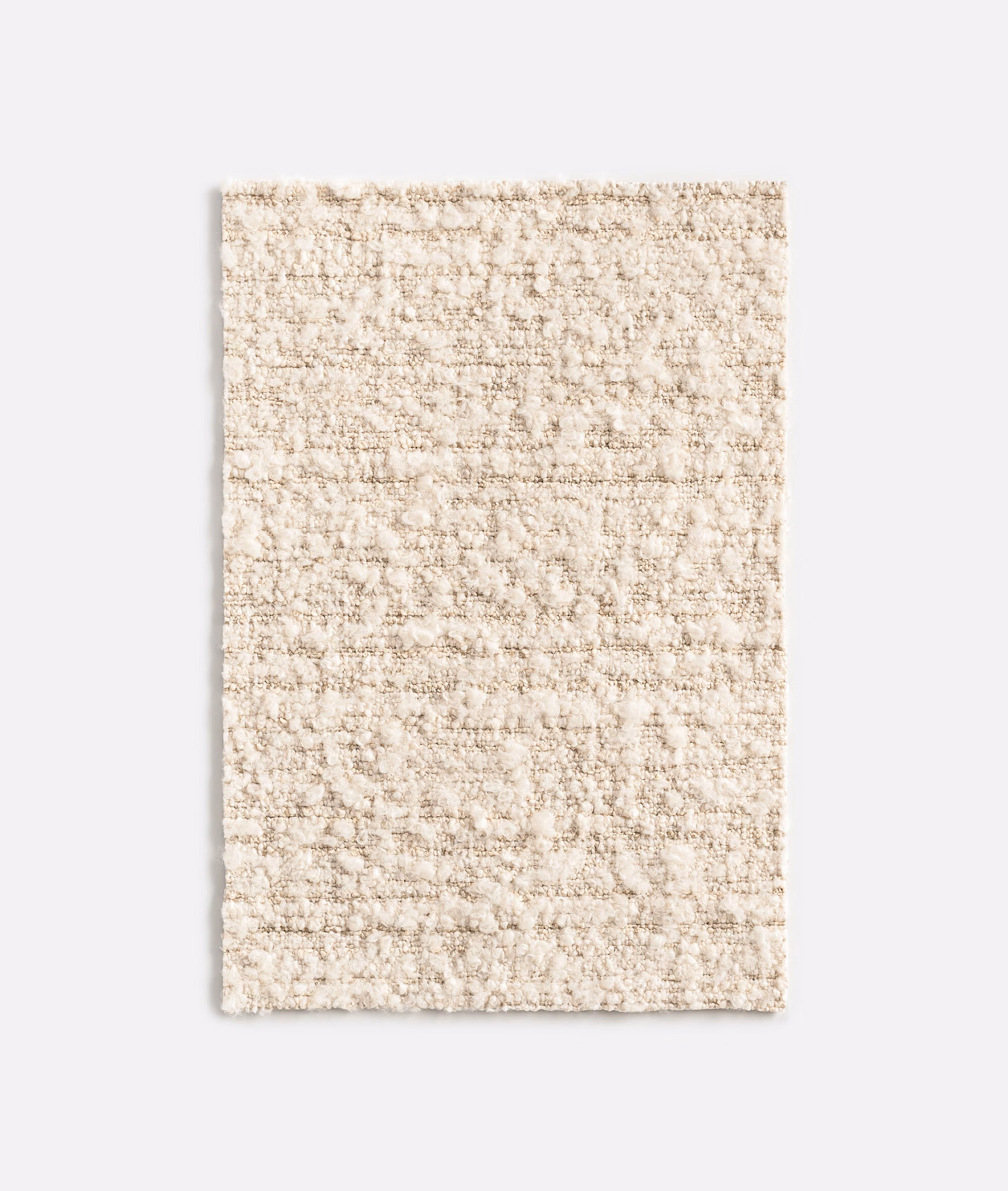 Warm ivory-beige nubby weave with irregular horizontal flecks and tactile surface