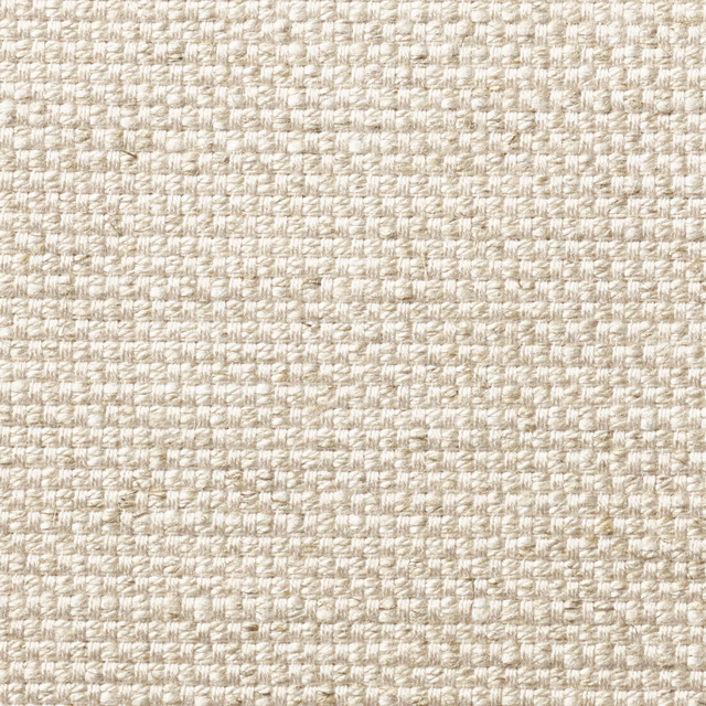 Warm ivory woven upholstery with fine beige flecks and nubby texture