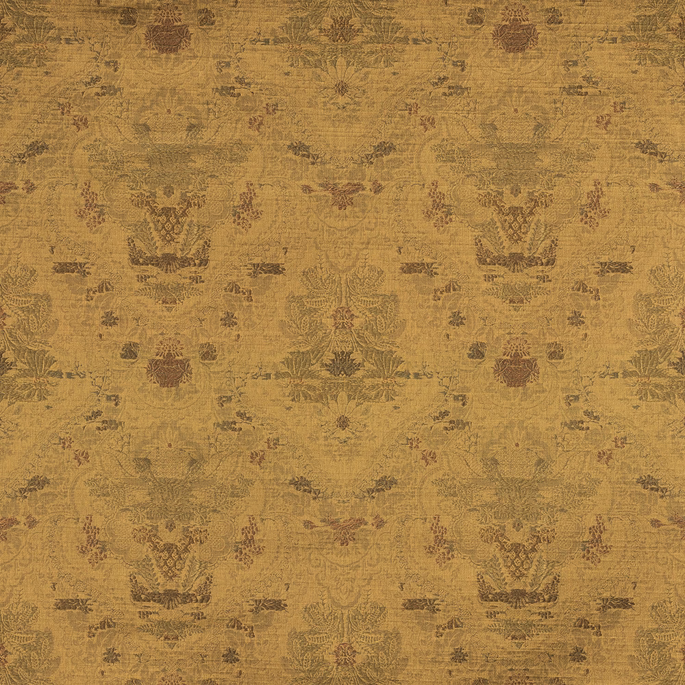 Ochre-gold woven textile with faded botanical bouquets and russet floral details