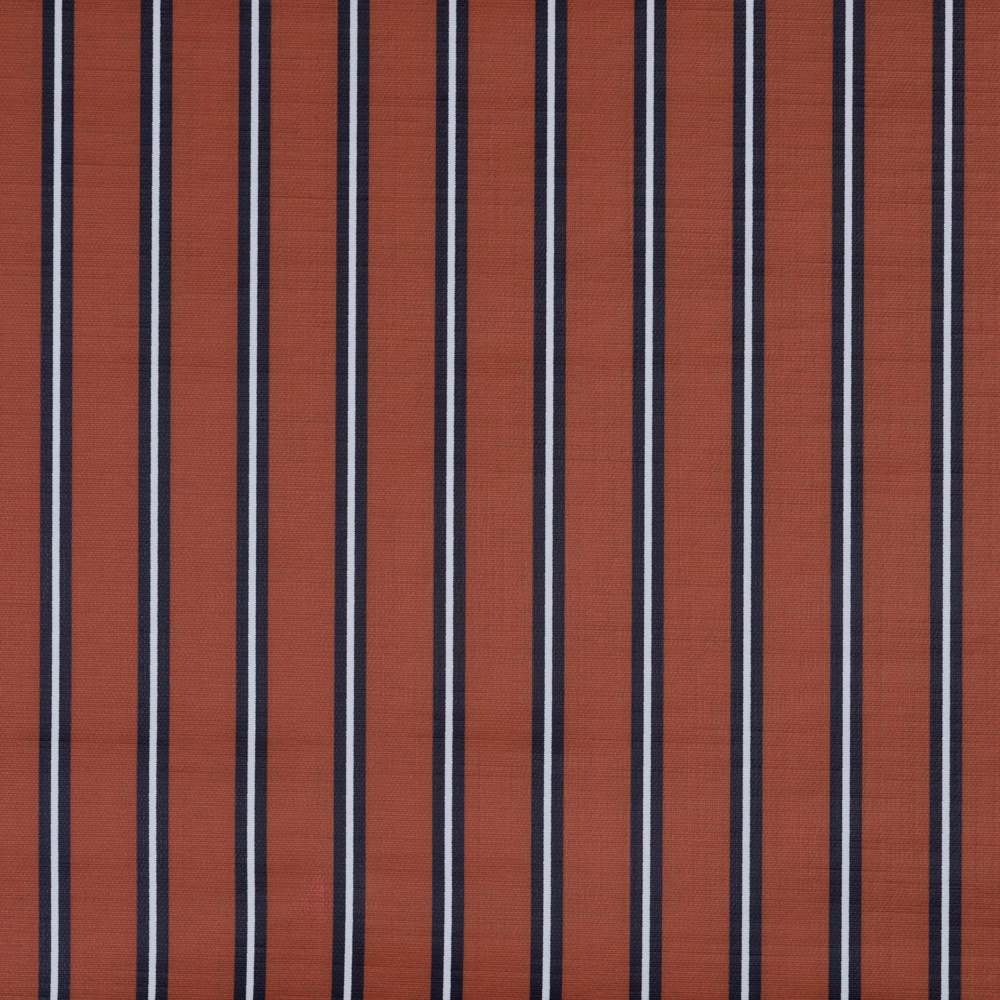 Rust terracotta textile with navy and pale vertical woven stripes