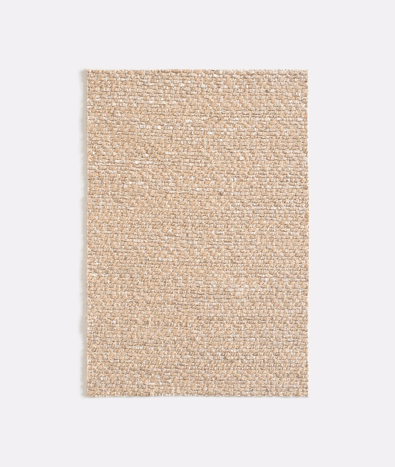 Pale blush-beige woven swatch with a softly nubby, irregular texture