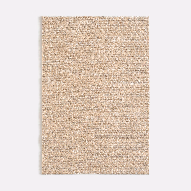Pale blush-beige woven swatch with a softly nubby, irregular texture
