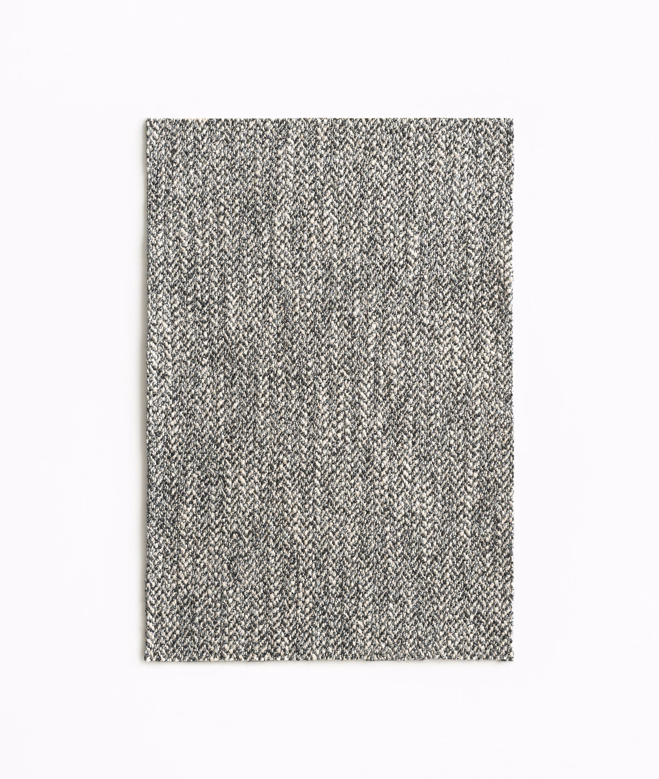 Charcoal and pale grey fabric with a fine vertical herringbone weave