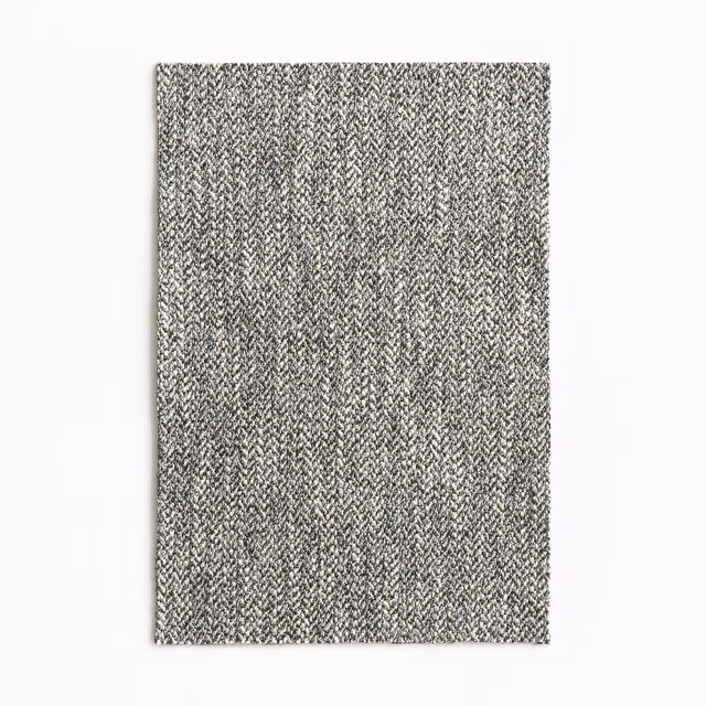 Charcoal and pale grey fabric with a fine vertical herringbone weave