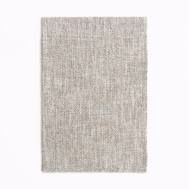 Close view of silvered greige fabric with fine flecked vertical weave