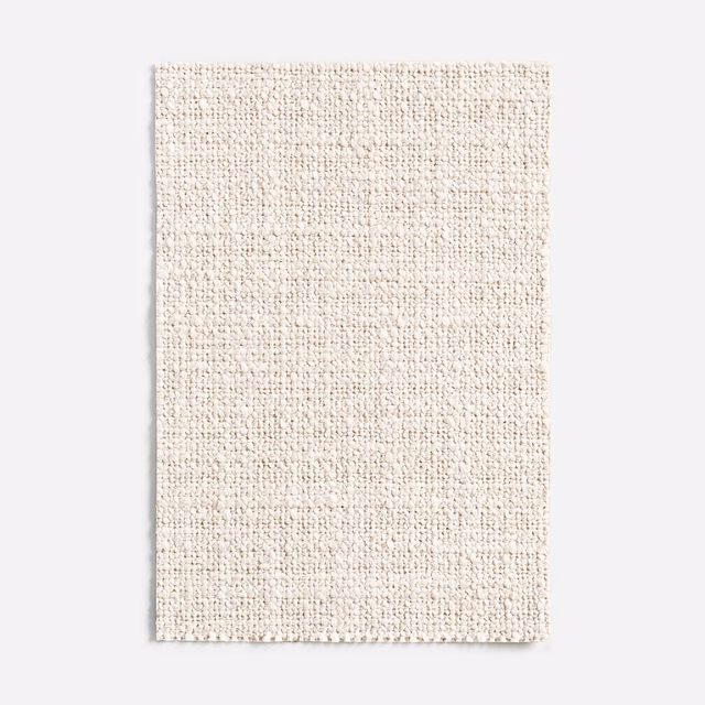 Pale natural-cream swatch with a fine, nubby woven texture and subtle beige flecks