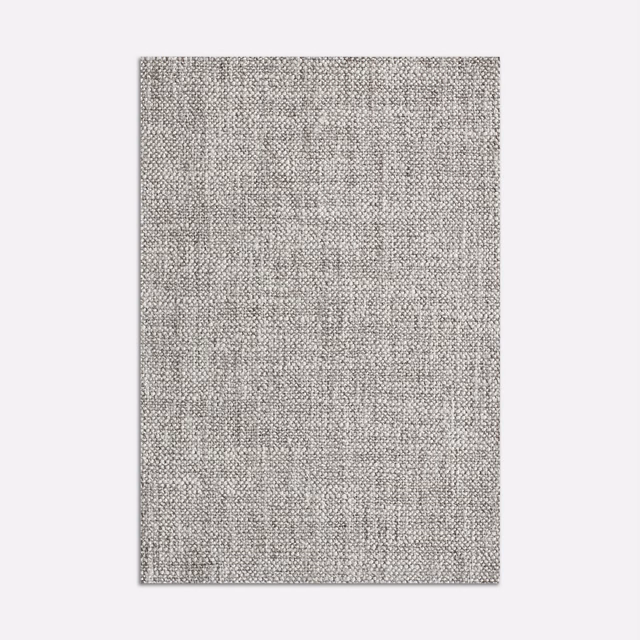 Cool granite-grey upholstery fabric with a dense, finely flecked woven texture