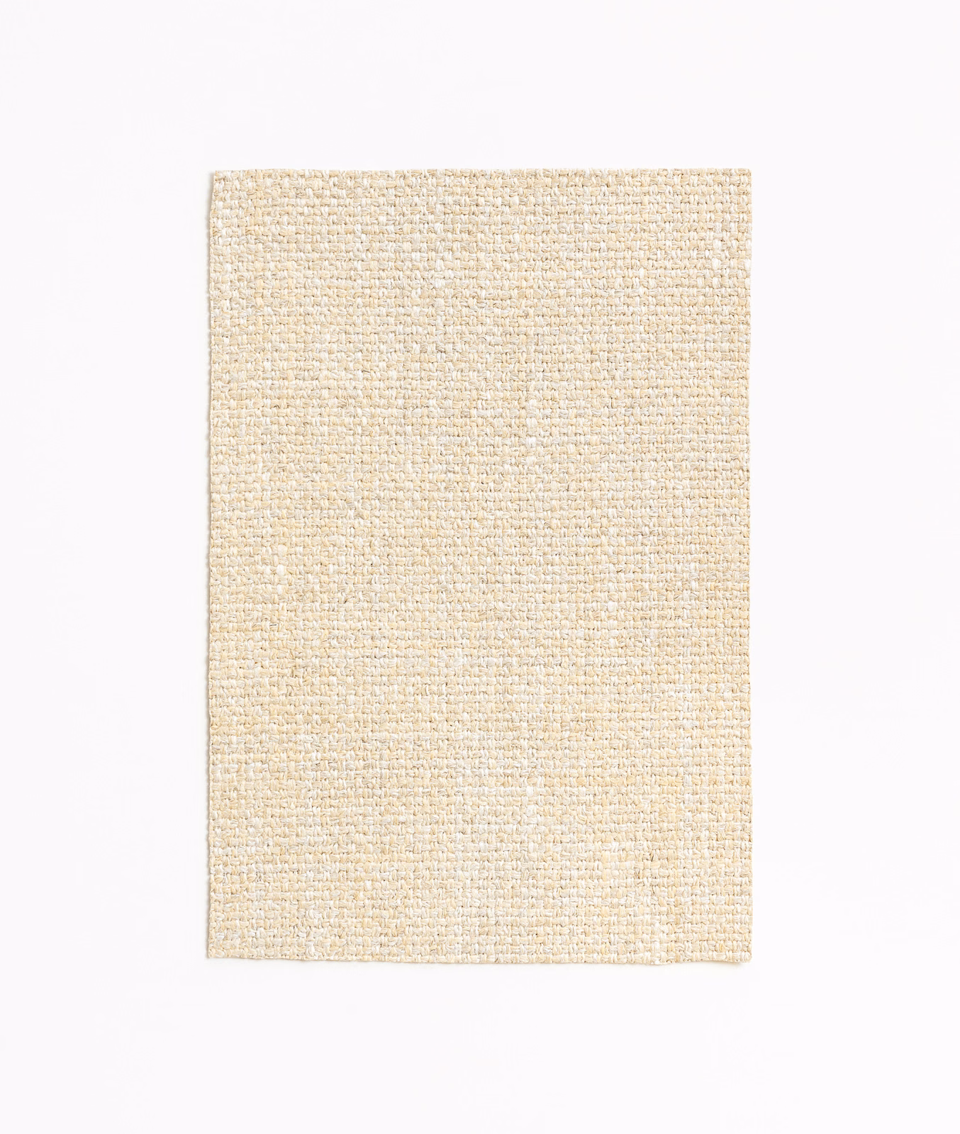 Warm ivory woven swatch with fine flecks and a softly ribbed texture