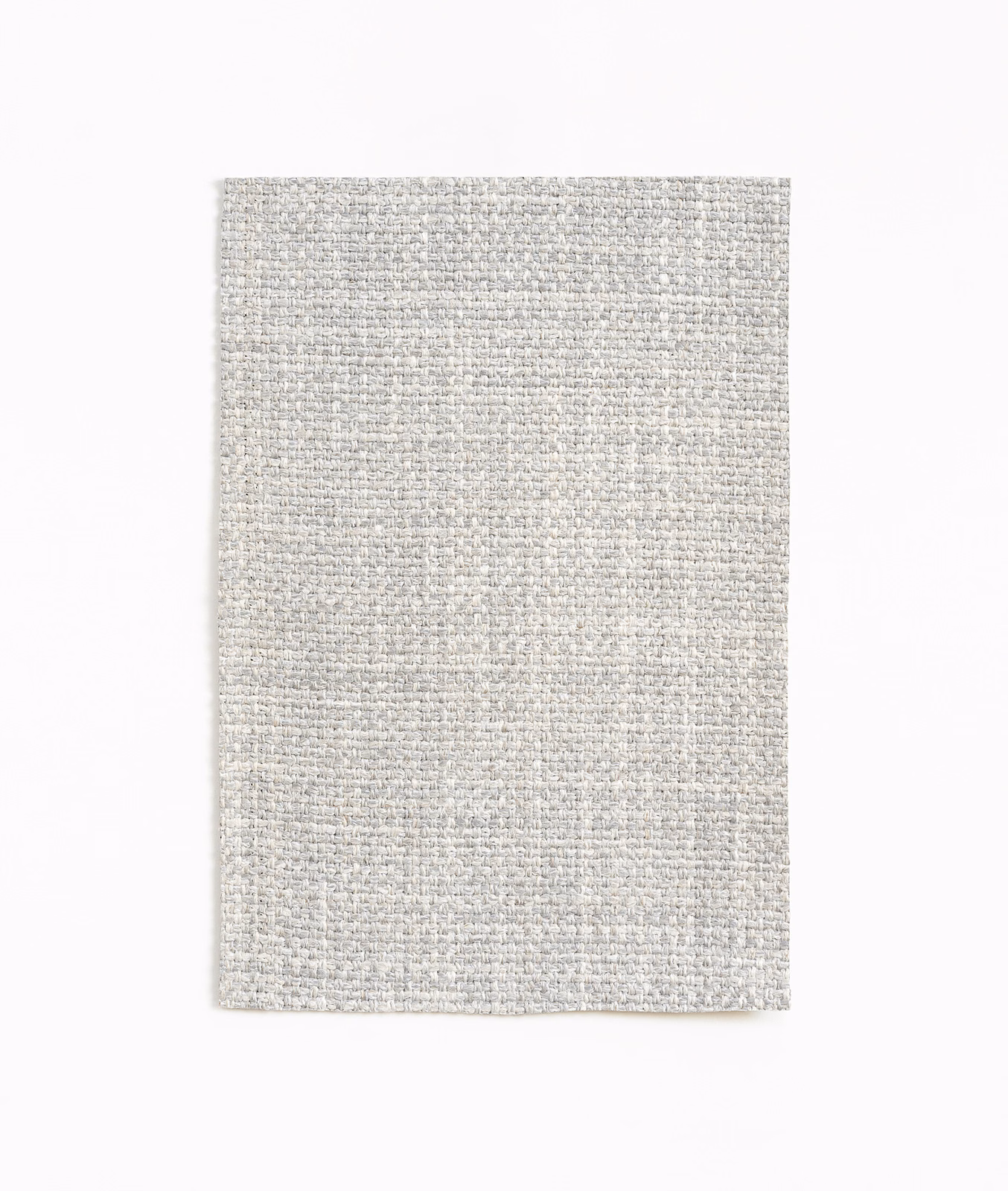 Pale pearl-grey Thelonious Perla swatch showing a close, softly mottled woven texture