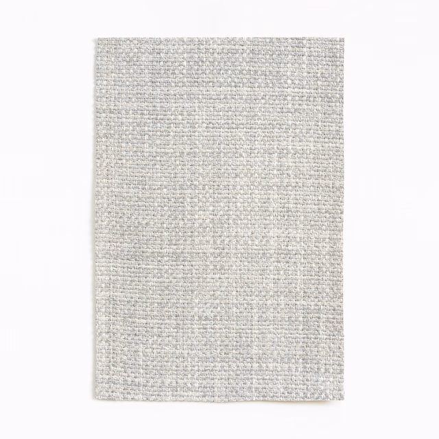 Pale pearl-grey Thelonious Perla swatch showing a close, softly mottled woven texture