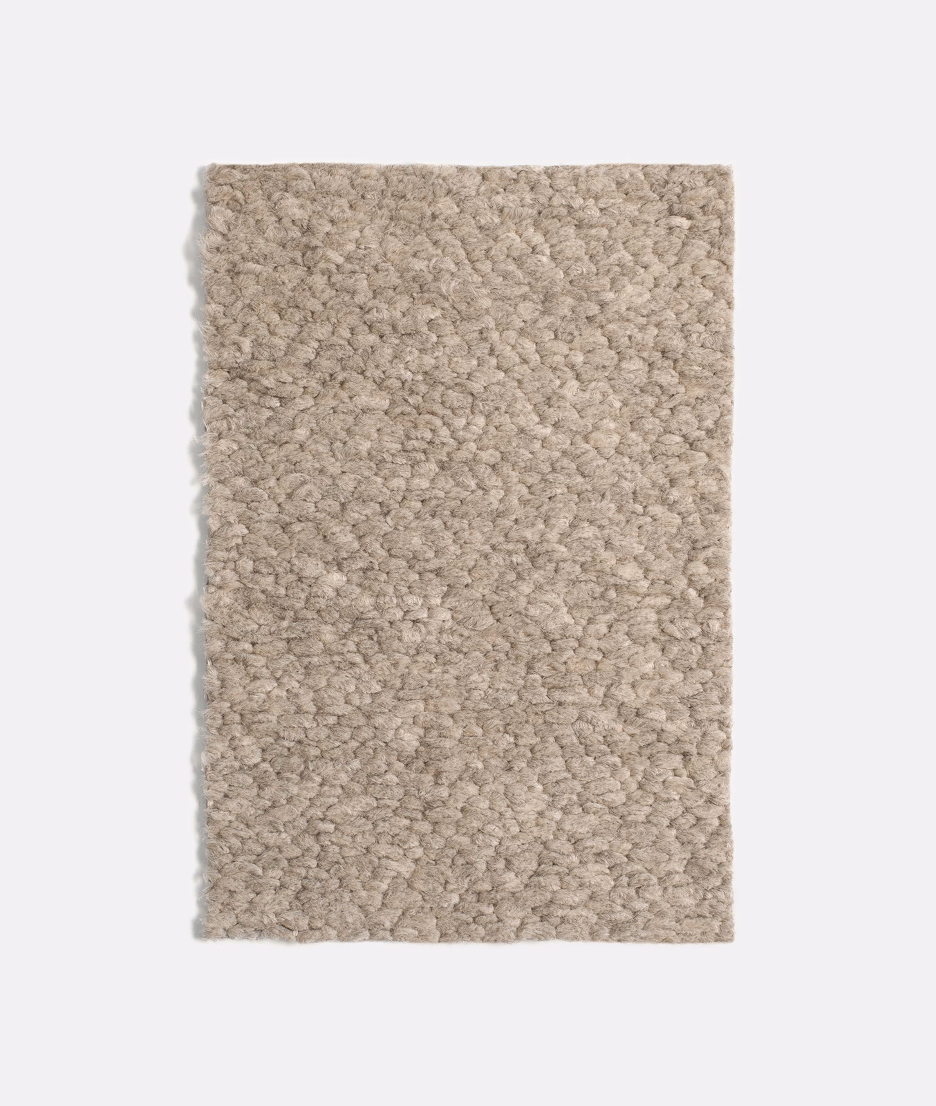 Warm greige taupe fabric swatch with dense irregular nubby loops and mottled depth
