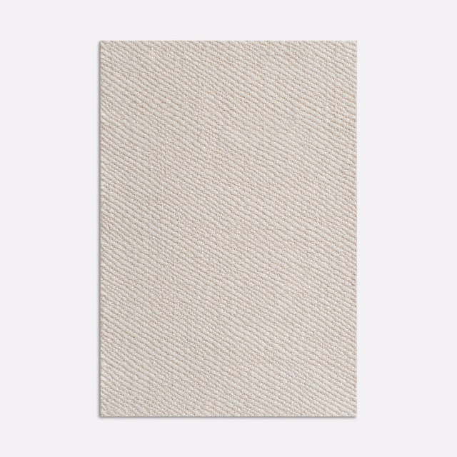 Warm ivory upholstery swatch showing a fine, even diagonal twill weave