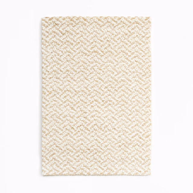 Warm ivory swatch with pale straw zigzag weave and softly nubby texture