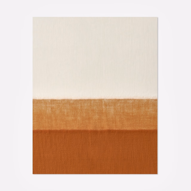 Ivory, caramel and burnt-orange horizontal bands in a subtly textured woven fabric